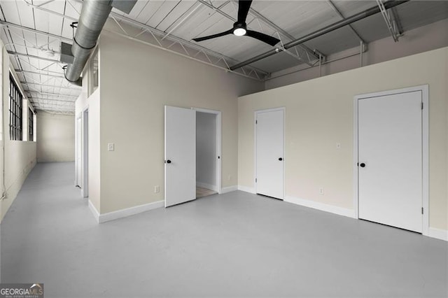 830 Dekalb Ave Unit 1, Atlanta, GA 30307 - garage featuring ceiling fan and baseboards