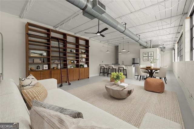 830 Dekalb Ave Unit 1, Atlanta, GA 30307 - living room featuring ceiling fan and finished concrete floors