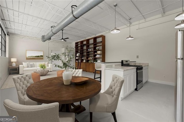 830 Dekalb Ave Unit 1, Atlanta, GA 30307 - dining area with baseboards, ceiling fan, and finished concrete floors