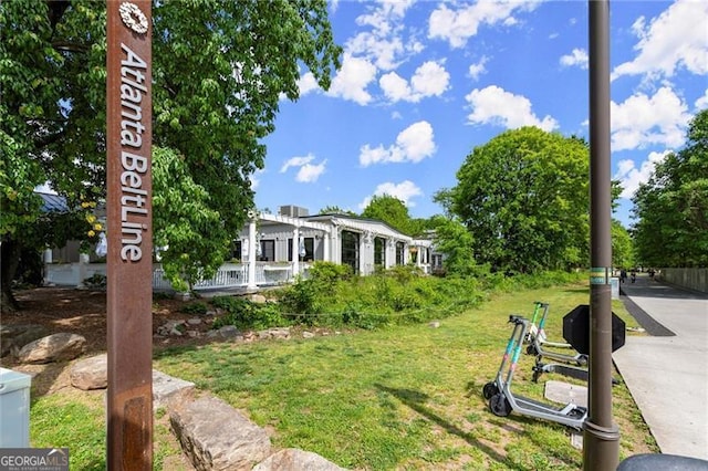 830 Dekalb Ave Unit 1, Atlanta, GA 30307 - view of community with a lawn