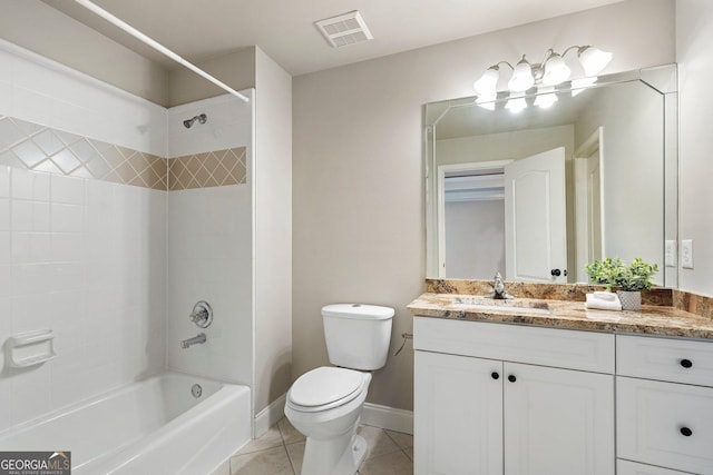 bathroom featuring tile patterned floors, toilet, shower / bath combination, vanity, and baseboards