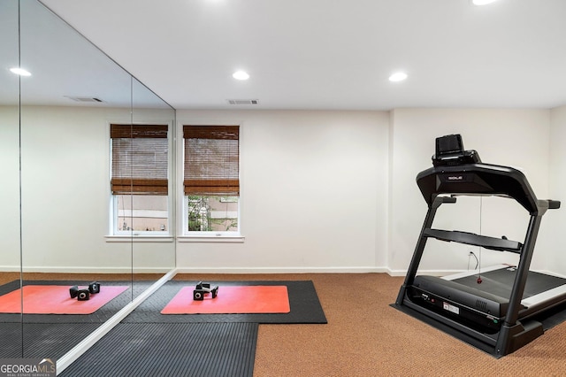 exercise room featuring recessed lighting, carpet, and baseboards