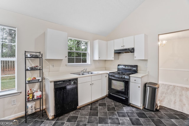 675 Michael Cir, Monroe, GA 30655 - kitchen featuring black appliances, a sink, under cabinet range hood, light countertops, and white cabinetry