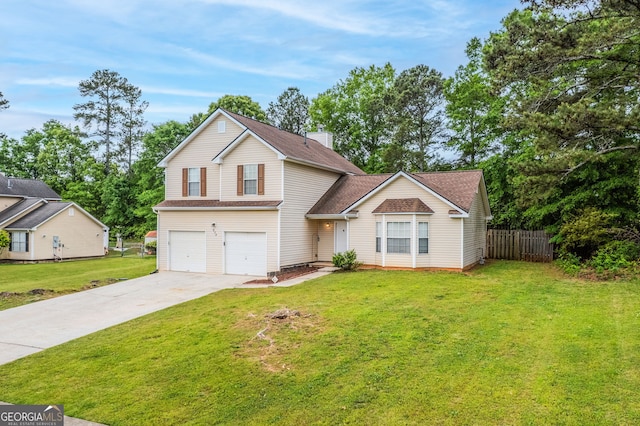 675 Michael Cir, Monroe, GA 30655 - traditional home featuring a garage, concrete driveway, a chimney, and a shingled roof