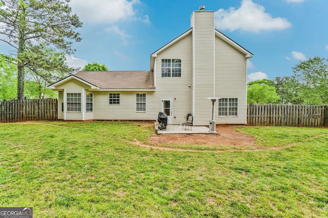 675 Michael Cir, Monroe, GA 30655 - back of property with a patio, roof with shingles, and a chimney