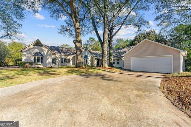 2490 Turtle Ter, Grayson, GA 30017 - view of front facade featuring a garage, a front lawn, and concrete driveway