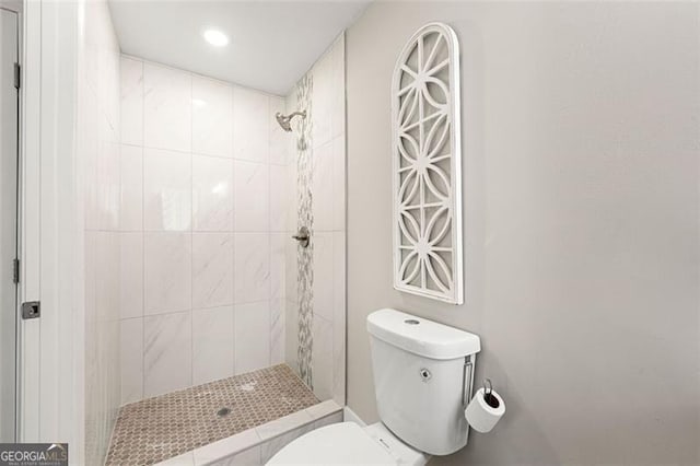 2490 Turtle Ter, Grayson, GA 30017 - bathroom with recessed lighting, tiled shower, and toilet