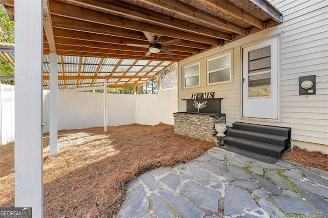 2490 Turtle Ter, Grayson, GA 30017 - view of patio featuring ceiling fan, entry steps, and fence
