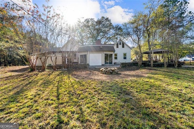 2490 Turtle Ter, Grayson, GA 30017 - rear view of house with a lawn