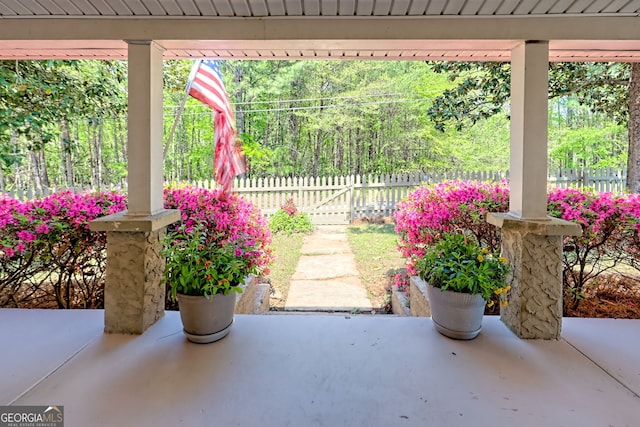 view of patio / terrace featuring fence