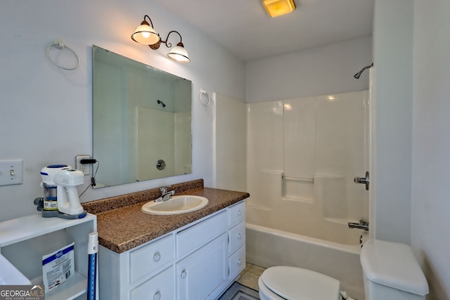 bathroom featuring toilet, tile patterned floors, shower / washtub combination, and vanity