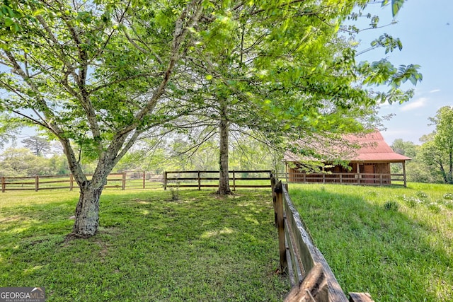 view of yard with an exterior structure and an outbuilding