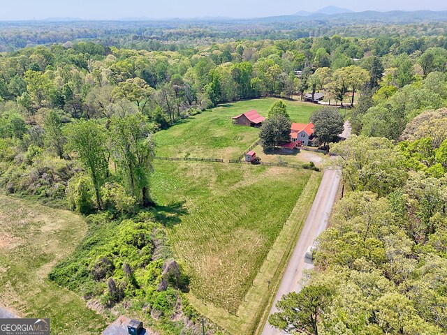 bird's eye view with a rural view and a forest view