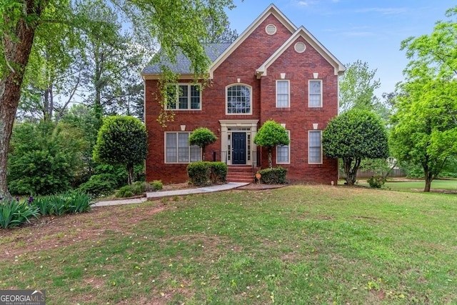 1720 Greystone Trce SE, Conyers, GA 30013 - view of front of house with brick siding and a front lawn