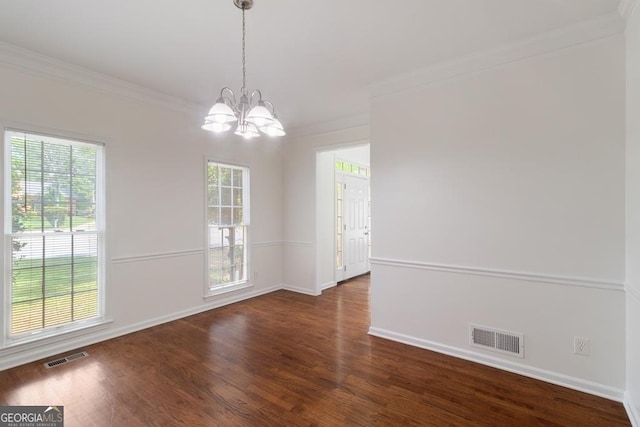 1720 Greystone Trce SE, Conyers, GA 30013 - unfurnished dining area with ornamental molding, wood finished floors, a chandelier, and baseboards