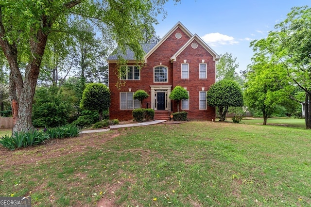 1720 Greystone Trce SE, Conyers, GA 30013 - view of front of home featuring brick siding and a front lawn