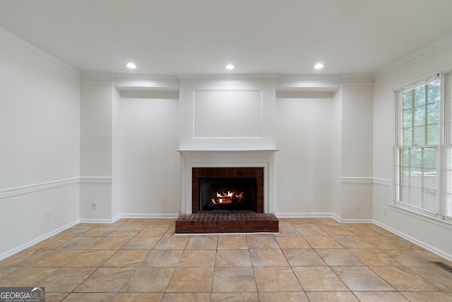 1720 Greystone Trce SE, Conyers, GA 30013 - unfurnished living room featuring ornamental molding, a brick fireplace, recessed lighting, baseboards, and light stone finish flooring