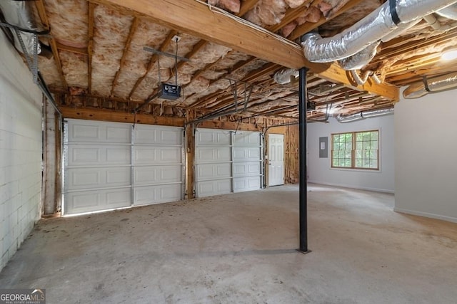 1720 Greystone Trce SE, Conyers, GA 30013 - garage featuring a garage door opener and electric panel