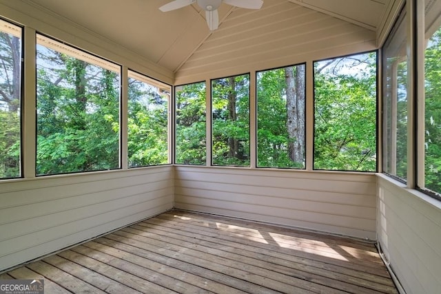 1720 Greystone Trce SE, Conyers, GA 30013 - unfurnished sunroom with a ceiling fan, vaulted ceiling, hardwood / wood-style floors, and wood walls