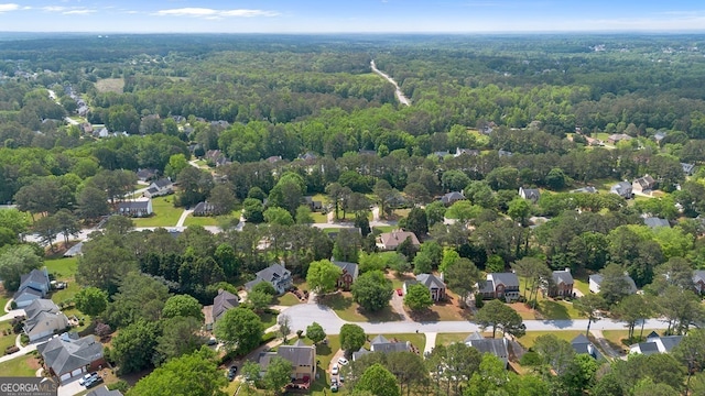 1720 Greystone Trce SE, Conyers, GA 30013 - aerial view of residential area featuring a heavily wooded area