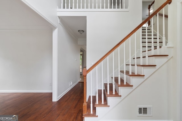 1720 Greystone Trce SE, Conyers, GA 30013 - stairway featuring ornamental molding, wood finished floors, and baseboards