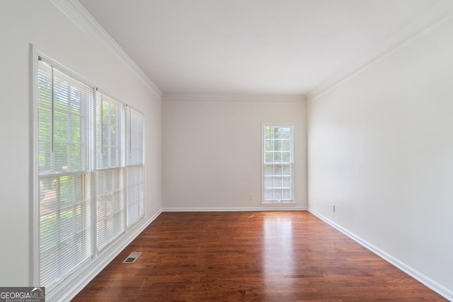 1720 Greystone Trce SE, Conyers, GA 30013 - unfurnished room with wood finished floors, crown molding, and baseboards