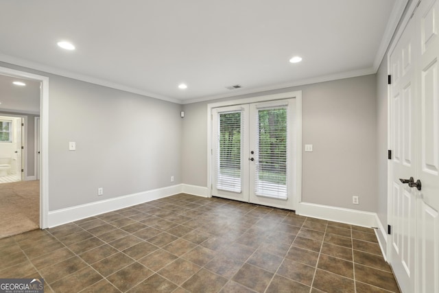 unfurnished room featuring a wealth of natural light, french doors, recessed lighting, and visible vents