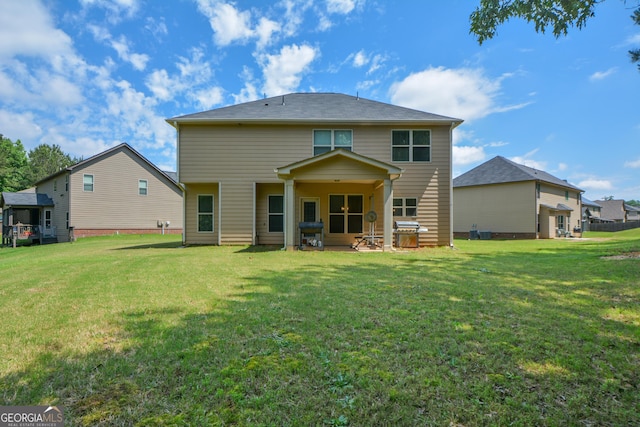 6816 Diamond Dr, Rex, GA 30273 - back of property with a yard