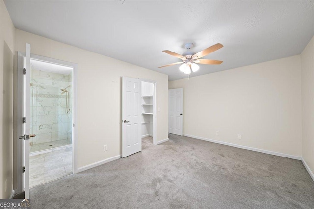 238 Chads Ford Way, Roswell, GA 30076 - unfurnished bedroom with carpet flooring, ensuite bath, a spacious closet, and a ceiling fan