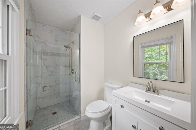 238 Chads Ford Way, Roswell, GA 30076 - bathroom featuring a marble finish shower, vanity, and tile patterned flooring
