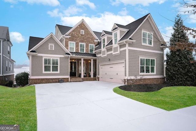 craftsman inspired home featuring a porch, concrete driveway, a front lawn, and a garage