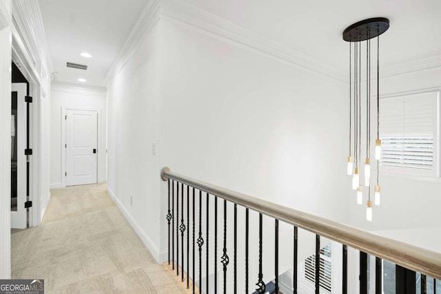 corridor with crown molding, carpet flooring, baseboards, and recessed lighting