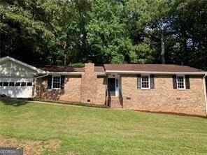 470 Ovara Ct, Stone Mountain, GA 30088 - ranch-style home featuring a front yard, an attached garage, a chimney, and crawl space