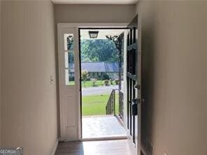 470 Ovara Ct, Stone Mountain, GA 30088 - entryway with plenty of natural light and wood finished floors