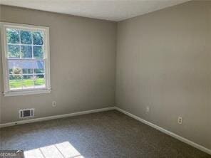 470 Ovara Ct, Stone Mountain, GA 30088 - unfurnished room featuring visible vents, baseboards, and carpet floors