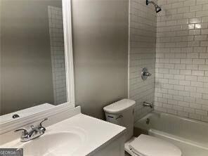470 Ovara Ct, Stone Mountain, GA 30088 - bathroom with toilet, shower / tub combination, and vanity