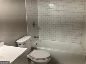 470 Ovara Ct, Stone Mountain, GA 30088 - full bathroom with vanity, toilet, and  shower combination