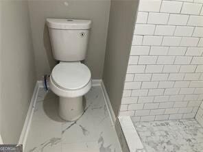 470 Ovara Ct, Stone Mountain, GA 30088 - full bath with toilet, a shower stall, and baseboards