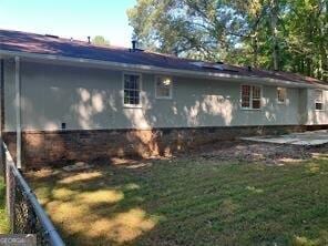 470 Ovara Ct, Stone Mountain, GA 30088 - view of home's exterior featuring a yard