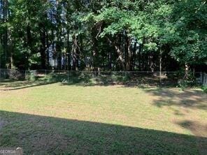 470 Ovara Ct, Stone Mountain, GA 30088 - view of yard with fence