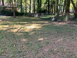470 Ovara Ct, Stone Mountain, GA 30088 - view of yard with a fenced backyard