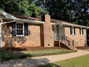 470 Ovara Ct, Stone Mountain, GA 30088 - ranch-style home featuring a chimney