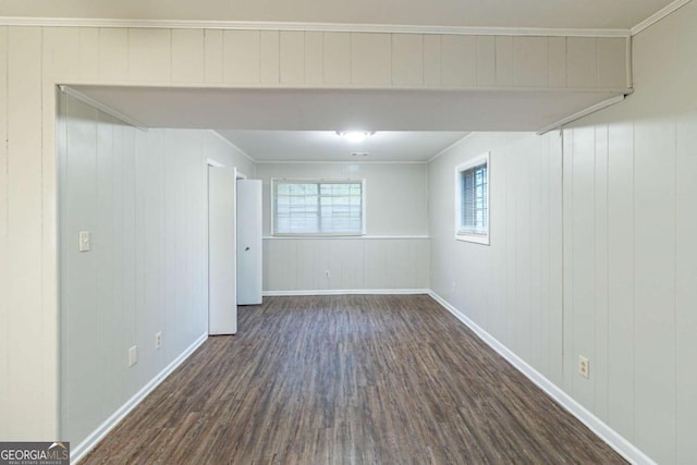 5802 Oakleaf Dr, Stone Mountain, GA 30087 - below grade area featuring baseboards and dark wood-style floors