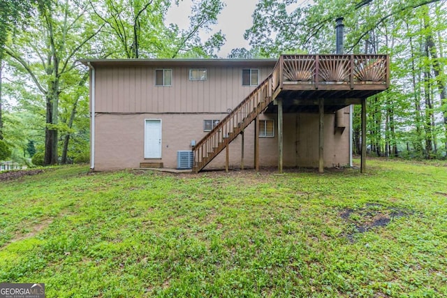 5802 Oakleaf Dr, Stone Mountain, GA 30087 - rear view of property with a lawn, cooling unit, stairway, and a wooden deck