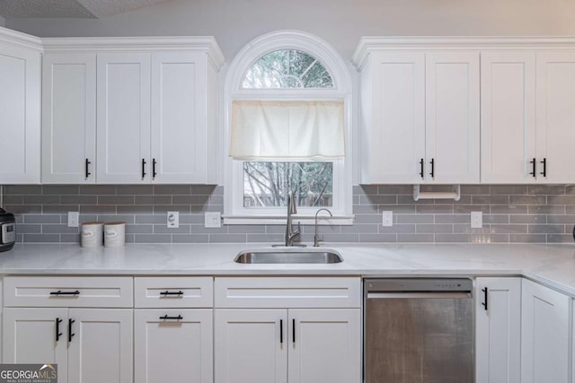220 Chandler Ct, Sugar Hill, GA 30518 - kitchen featuring stainless steel dishwasher, a sink, white cabinets, and decorative backsplash
