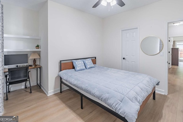 220 Chandler Ct, Sugar Hill, GA 30518 - bedroom featuring light wood-style flooring, a ceiling fan, and baseboards