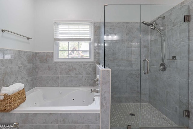 220 Chandler Ct, Sugar Hill, GA 30518 - bathroom with a jetted tub and a stall shower