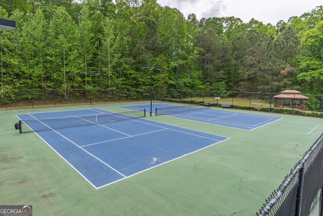 220 Chandler Ct, Sugar Hill, GA 30518 - view of tennis court with a gazebo, a forest view, and community basketball court