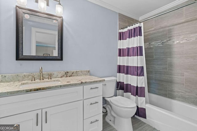 full bathroom featuring ornamental molding, shower / tub combo with curtain, toilet, and vanity