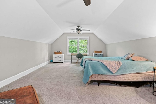 bedroom featuring baseboards, ceiling fan, lofted ceiling, and carpet
